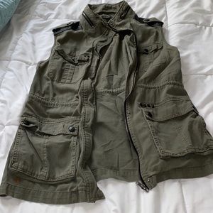 short sleeve green zip up coat.
